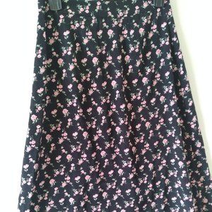 Good Luck Gem Midi A Line Skirt, Floral print, offset button front with slit.